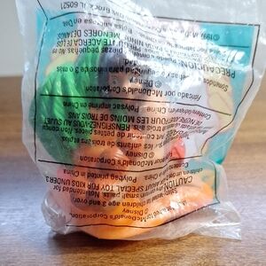 Jungle Books Mowgli Green and Orange Toy Figure, Mcds Vintage 1997